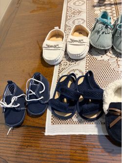 12 Pairs baby shoes. ALL NEW $5 each