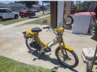 Yellow Old school Honda motorcycle