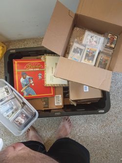 Tons of sports cards baseball ,hockey ,NBA ,NFL and pocket size helmets and autographs