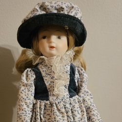 Porcelain Doll October Collectible with Tag