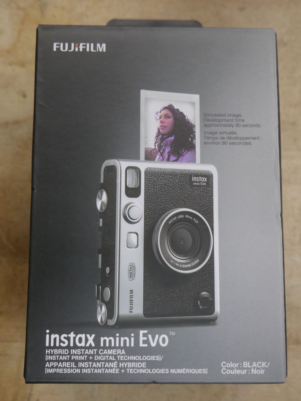   Fujifilm instax mini Evo Hybrid Instant Camera - Black new. 
