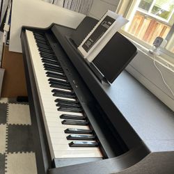Yamaha Clavinova CLP-311 electric piano