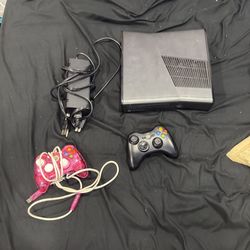 Xbox 360 with cord. Works. No memory Card