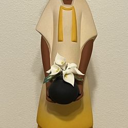 Sculpture Of Woman Bearing Gift