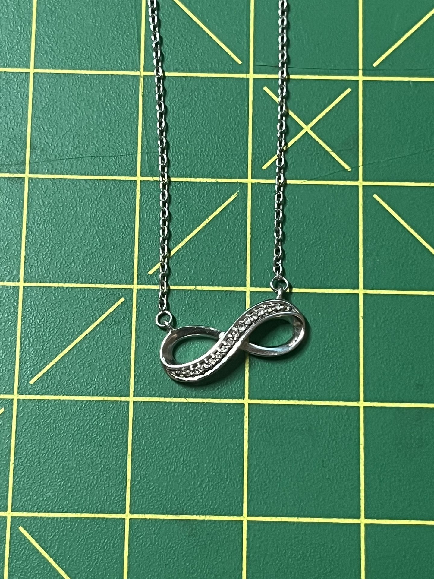 Genuine Diamonds And Sterling Silver Infinity Necklace 