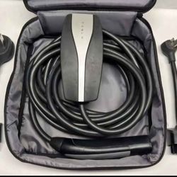 Genuine Tesla mobile charger Gen 2. Comes with 110V and 220V and with J1772 adapters