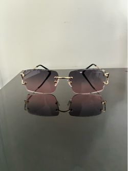 Purple Cartier Rimless Sunglasses