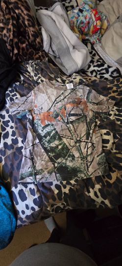 Young boys camouflage like shirts with tree like branches and leaves shirt size 8/10