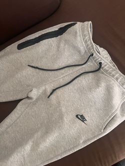 gray Nike tech sweats