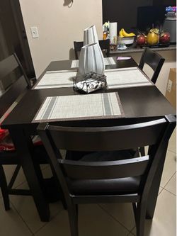 Dinning table for four barely used $300