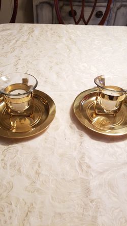 Brass candle holders, either free standing or can be hung on wall