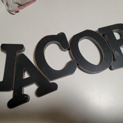 Letters Spelling JACOB