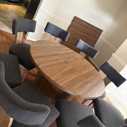 8 Dining Chairs + Table W/cabinets And Leaf
