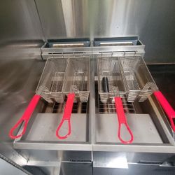 Commercial Deep Fryers (2)Dukers Commercial Gas Fryers are designed for high-volume frying in restaurants, cafeterias, and catering services.