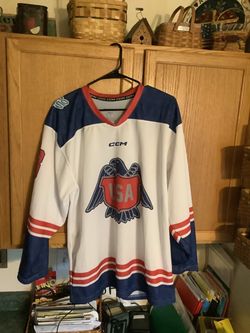 Team USA white CCM hockey jersey from Nations Cup In Detroit , size adult size large No snags or stains hard to find jersey Type: Ice hockey jersey (