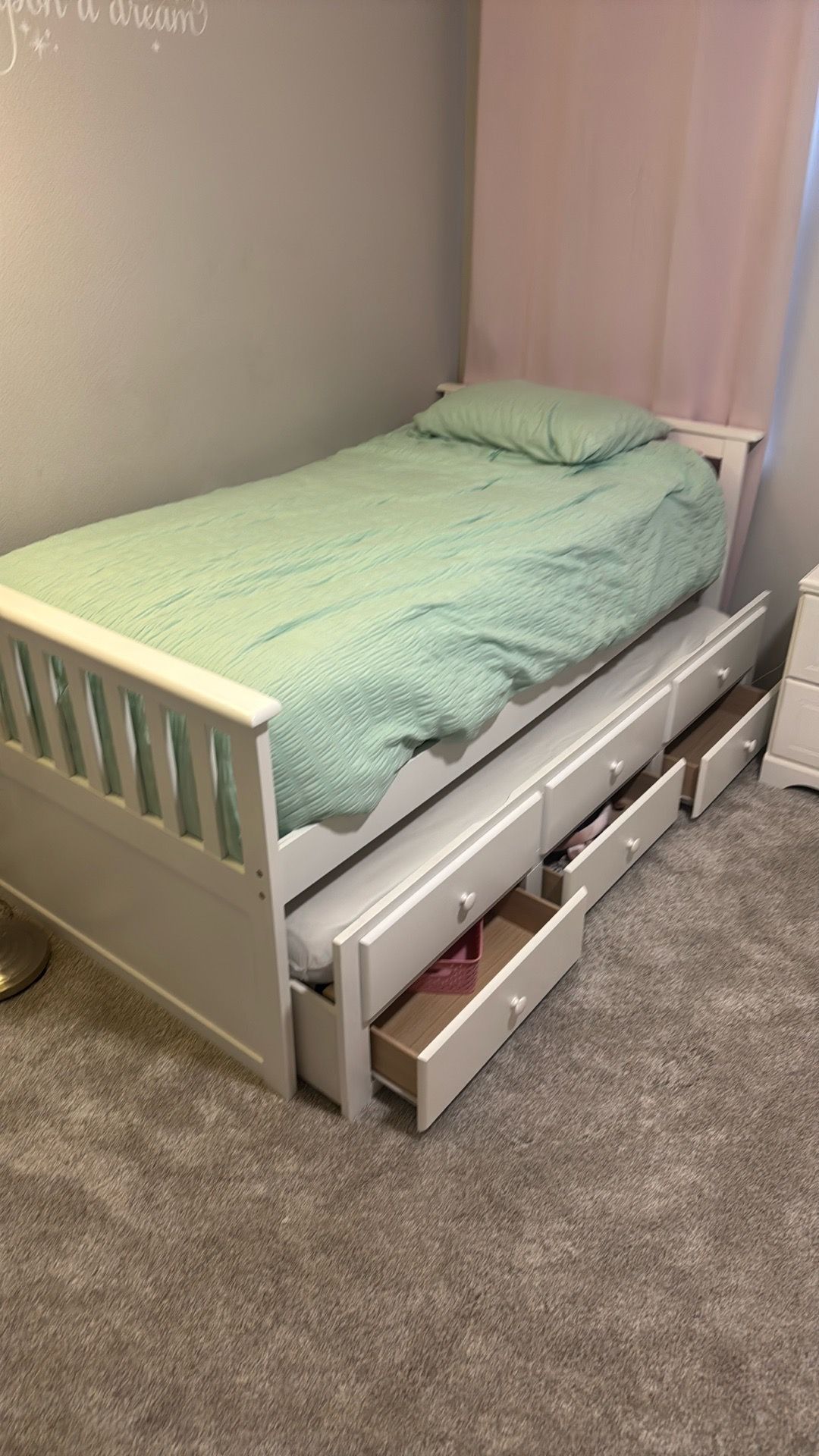 White wood twin trundle bed, white nightstand, white six drawer dresser