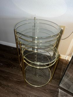 Modern gold and glass top nesting tables