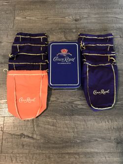 Crown Royal Collectors Tin & 9 Cloth Bags