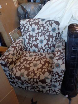 Brown and teal flower chair