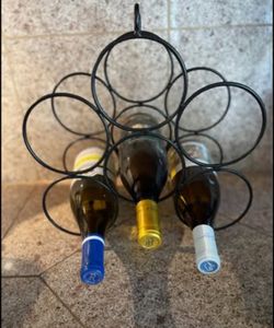 DECORATIVE WINE HOLDER