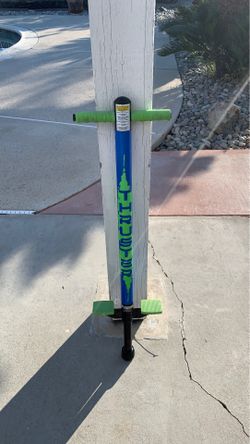 A cool blue and green pogo stick