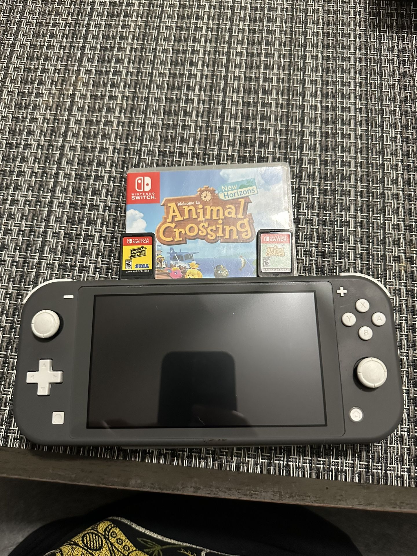 Nintendo Switch light with 2 games $110