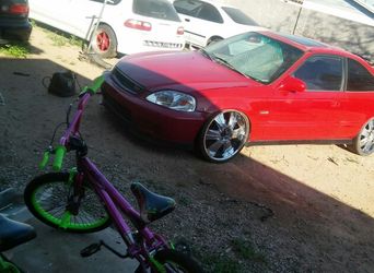 Good condition 20 inch wheels with low profile tires