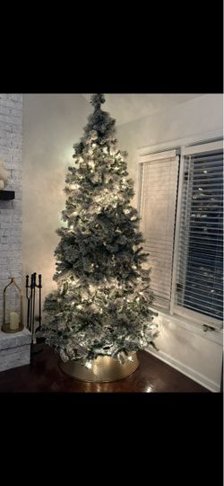 9’ flocked Christmas tree
