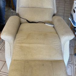 BEIGE RECLINER- NEEDS CLEANING - ELECTRIC 