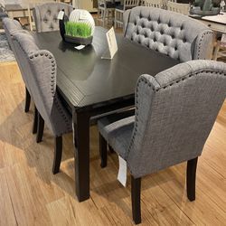 Dining Table and Gray Upholstered Chairs 
