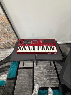 Akai Professional MAX49 49-Key Semi-Weighted MIDI Controller w/ Pads, Faders
