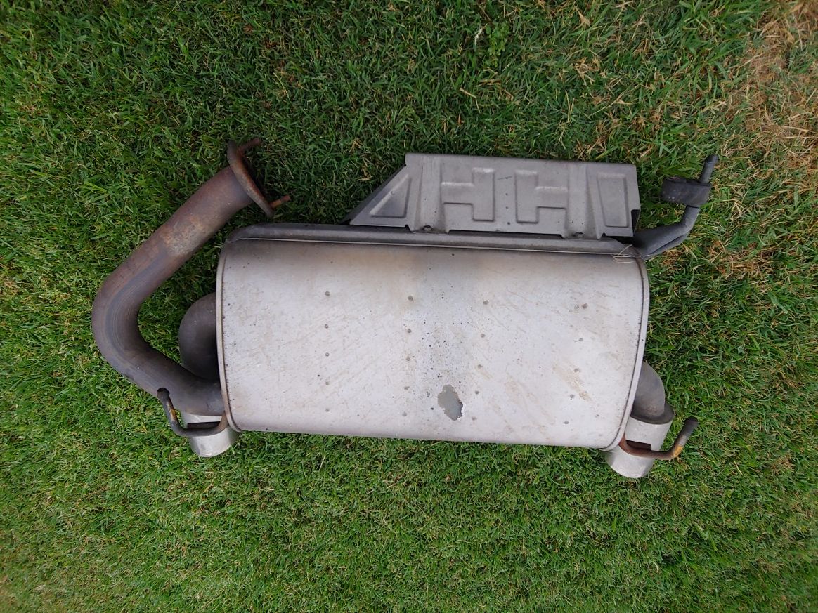 Nissan 350Z OEM muffler with chrome tips and a Borla resonator