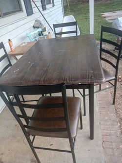 Strong Rectangular Table..with 4 Chairs..Good Condition....