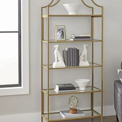 Glass, gold bookshelf