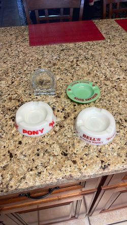 Four vintage ashtrays