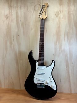 Beautiful Yamaha EG303 Black Solid Body Electric Guitar (Professionally Serviced and Setup)