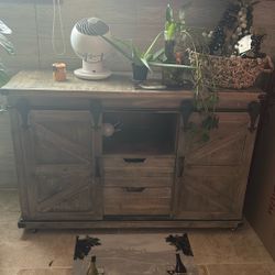 Two side compartments with burn doors and three drawers and shelf