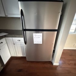 Refrigerator With I've Maker GE