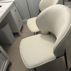 Two white chairs