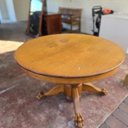 Antique Wooden Round Table With Claw Feet. 