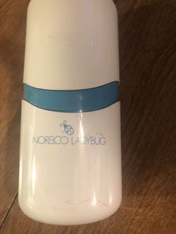 Vintage Norelco Ladybug Shaver