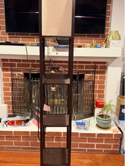 Standing lamp with shelves and usb plug
