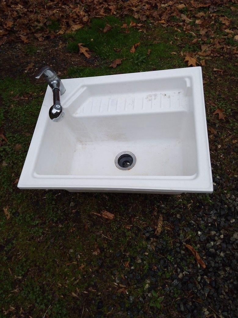 LAUNDRY. SINK. WITH SPRAY WAND FAUCET