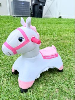 Selling a Radio Flyer unicorn ride-on with wheels.
