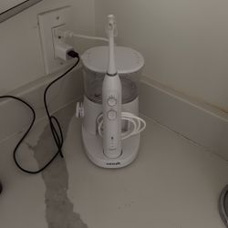 Waterpik - Waterflosser toothbrush