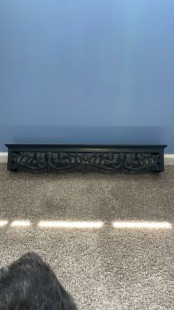 Floating black shelf