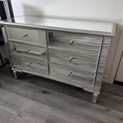 Long glass / mirrored dresser