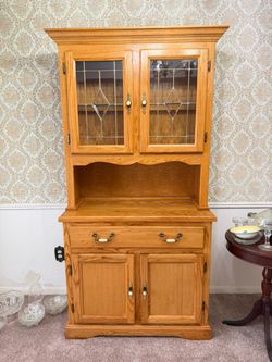 Two piece lighted China Hutch with Leaded Glass Doors