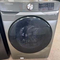 Samsung steam gray/silver gas front loading dryer 90 day warranty $200
