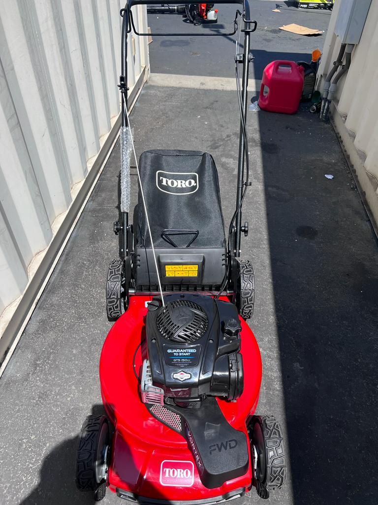 Toro 22 in. Recycler Briggs & Stratton High Wheel FWD Gas Walk Behind Self Propelled Lawn Mower with Super Bagger